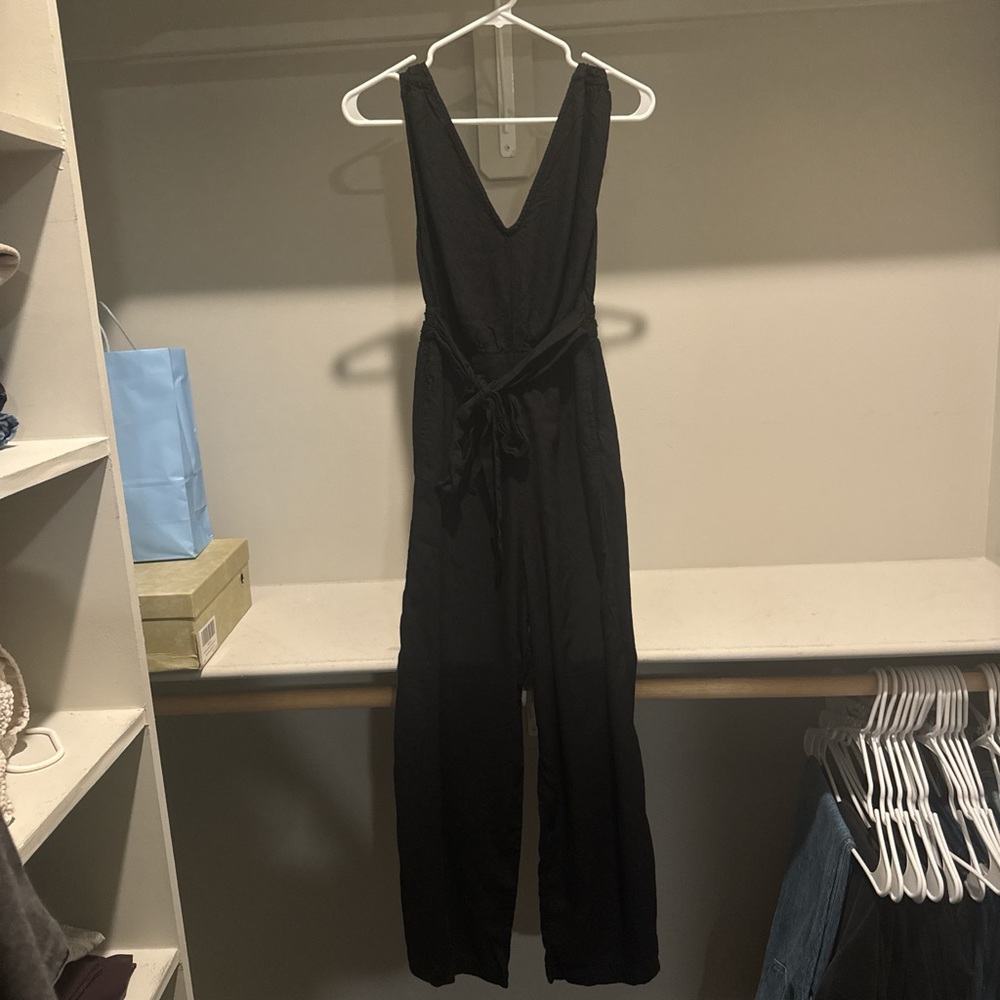Black jumpsuit with super cute tie waist detail with bow, super cute fabric